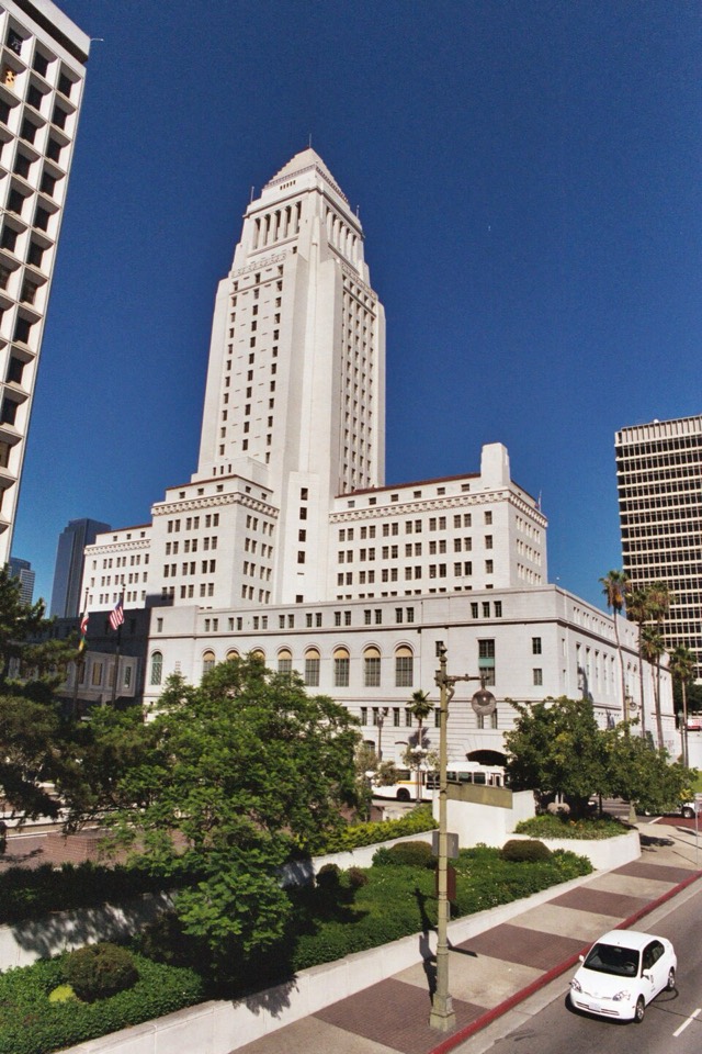 The tower of Los Angeles City Hall against a clear sky